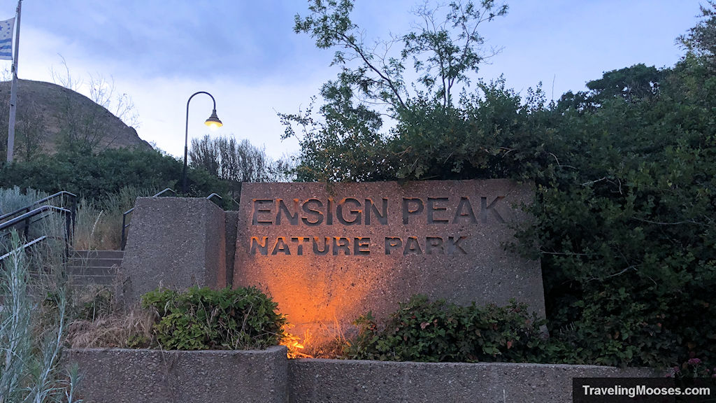 Ensign Peak Nature Park Entrance Sign lite up at night