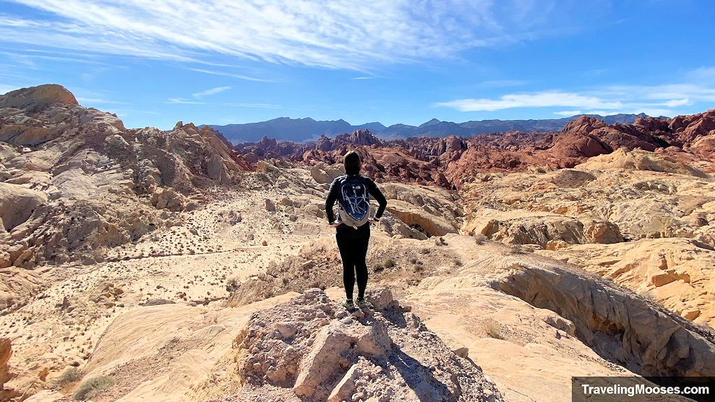 Women gazing out into Fire Canyon